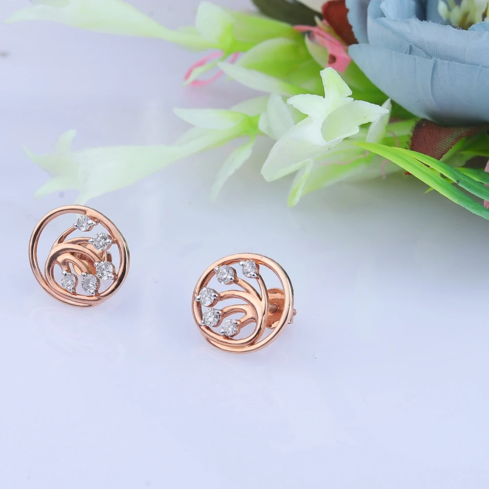 Rose gold swirl earrings